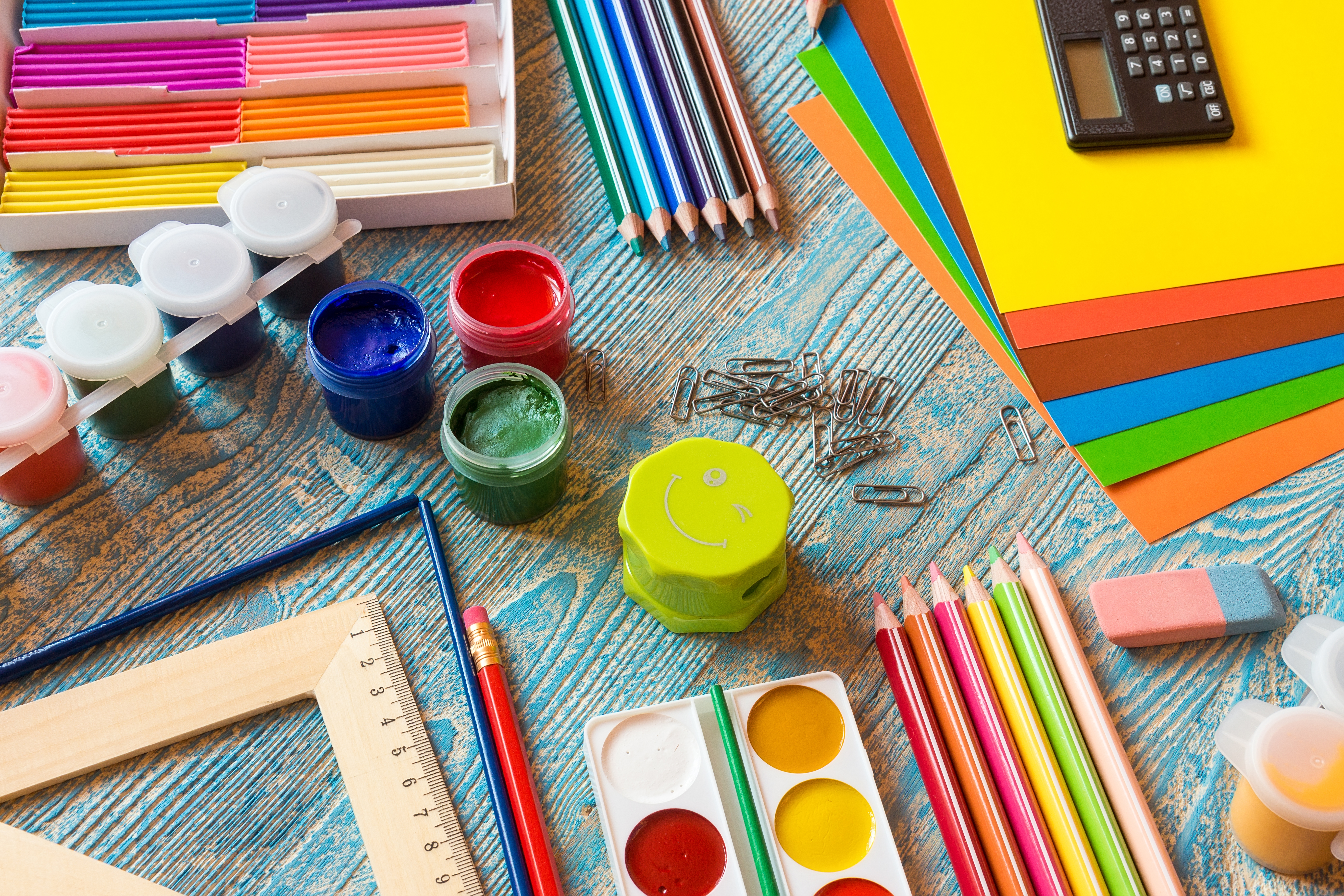 vecteezy_school-supplies-on-a-blue-background_13620731 image