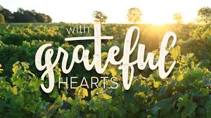 With Grateful Hearts banner