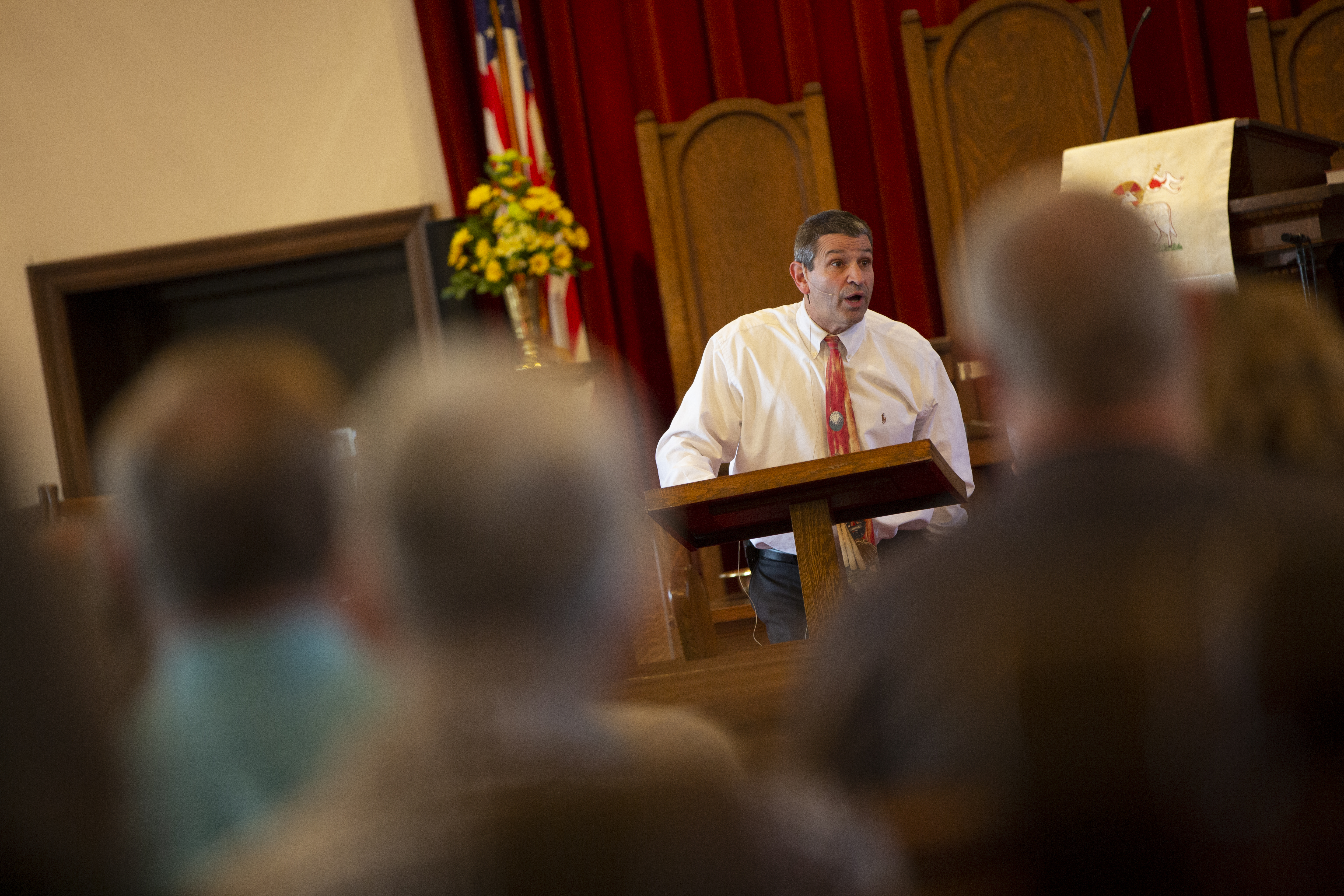 Pastor John Preaching - with congregation image