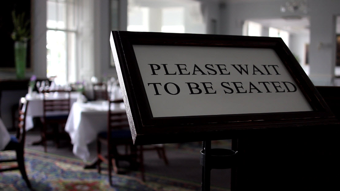 Please-wait-to-be-seated-sign