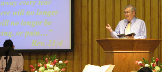 Pastor Arnold speaking