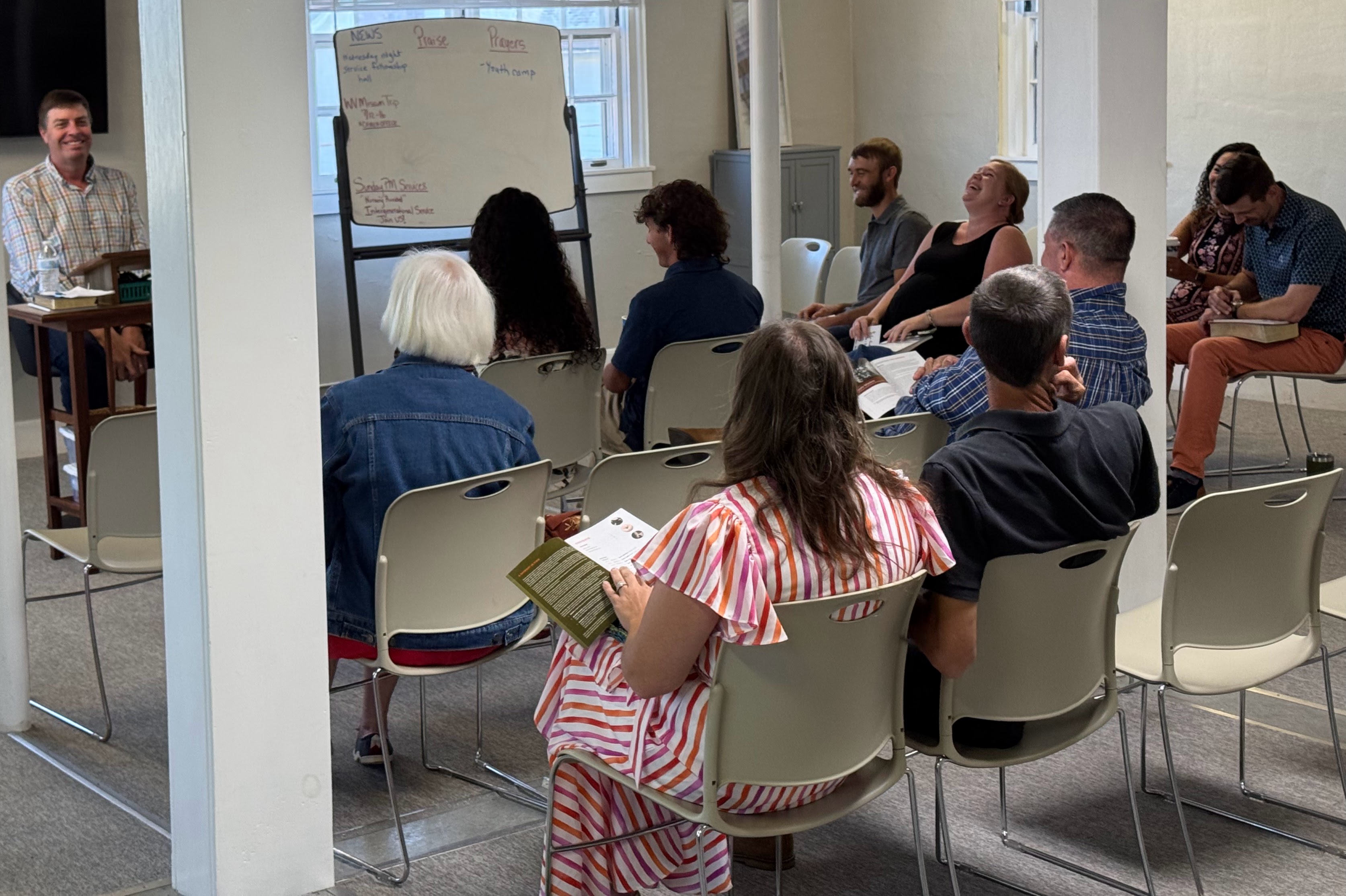Adults studying the Bible during midweek Bible study at FBC Waynesboro