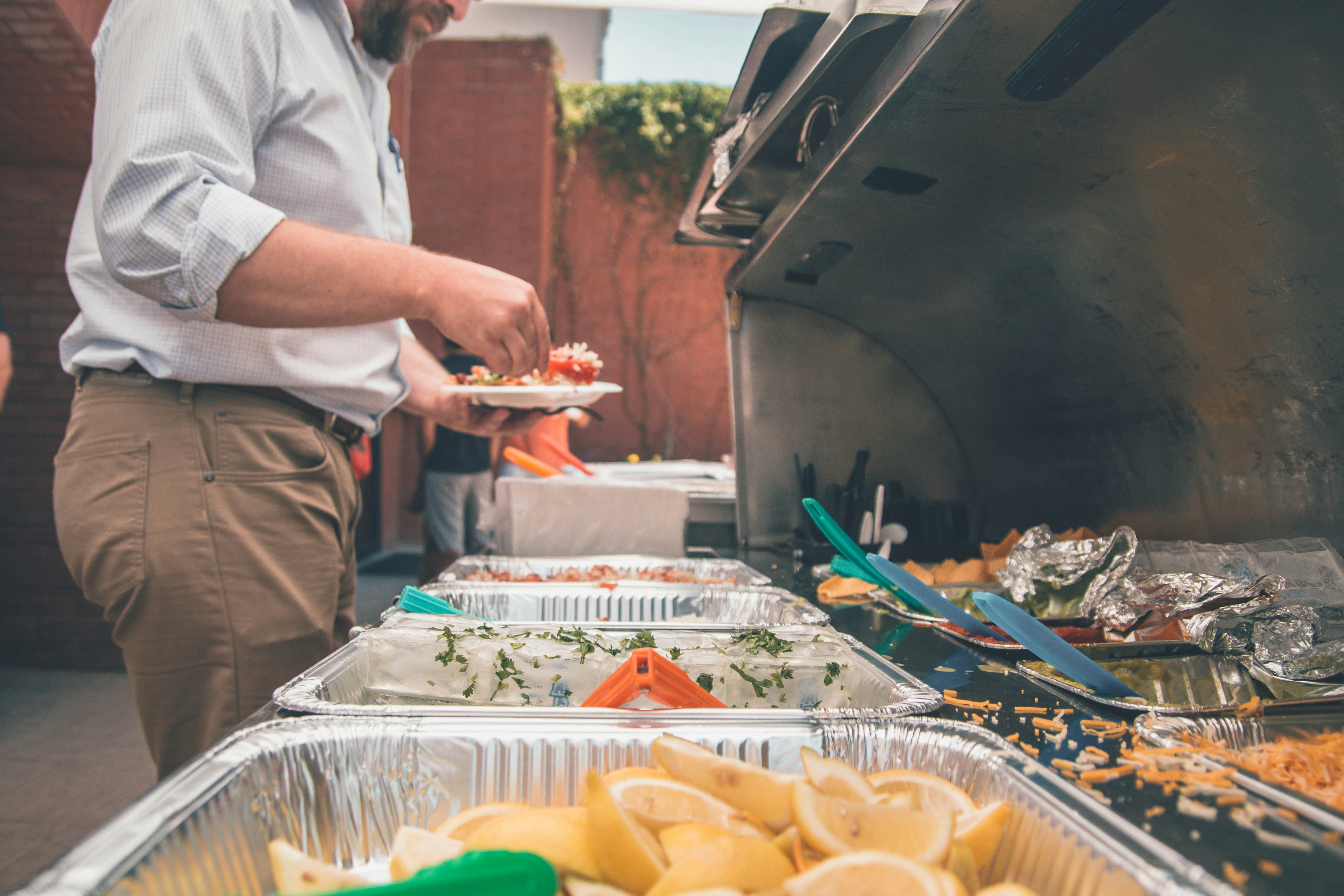 Church member serving food during FBC Waynesboro’s Wednesday night family meal