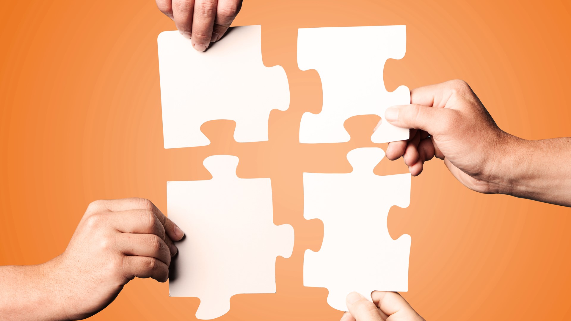 four_puzzle_pieces_fitting_together-1920x1280