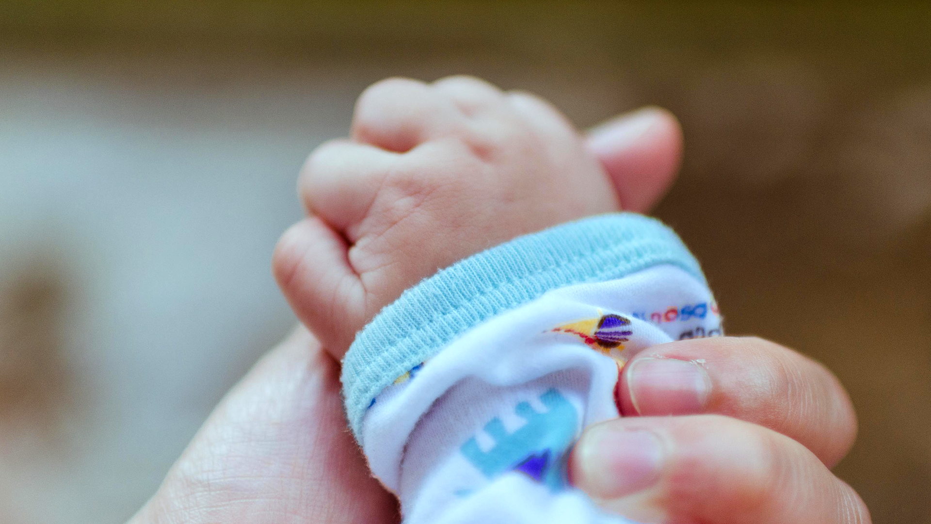 Dedication baby hand photo