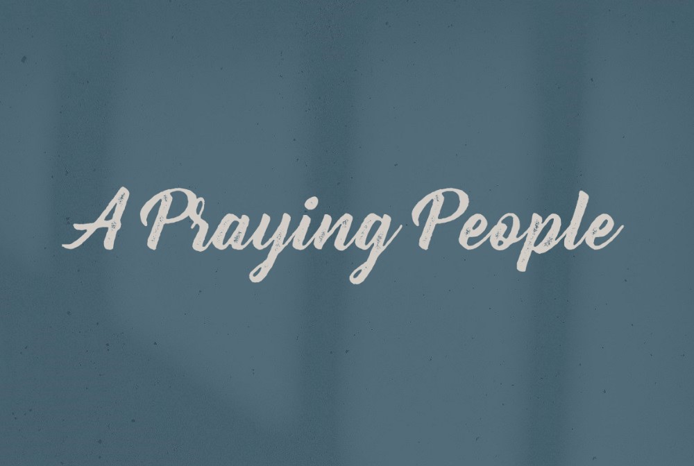 A Praying People banner