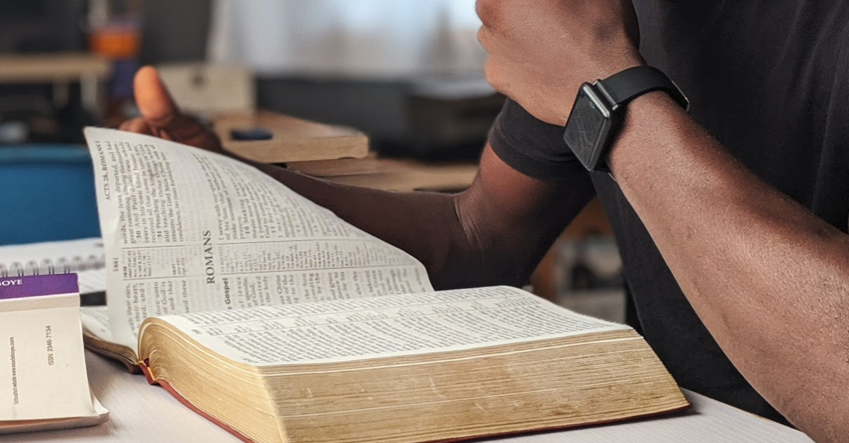 12626-man-wearing-reading-bible-oladimeji-ajegbile-