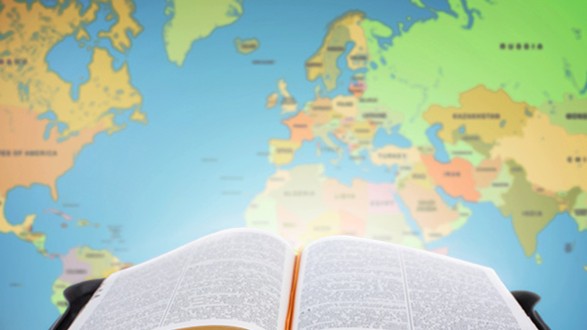 Bible in front of map