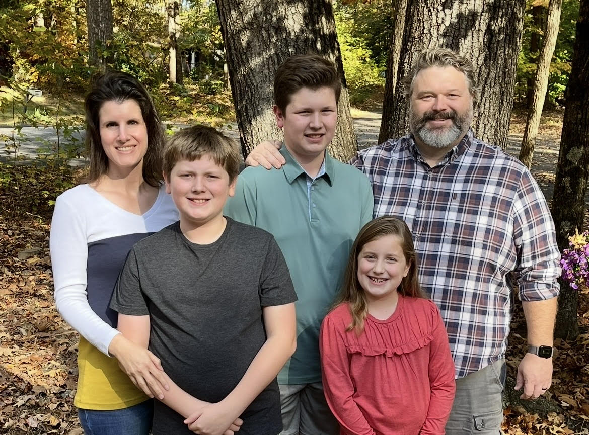 Photo of April, her husband, and 3 children