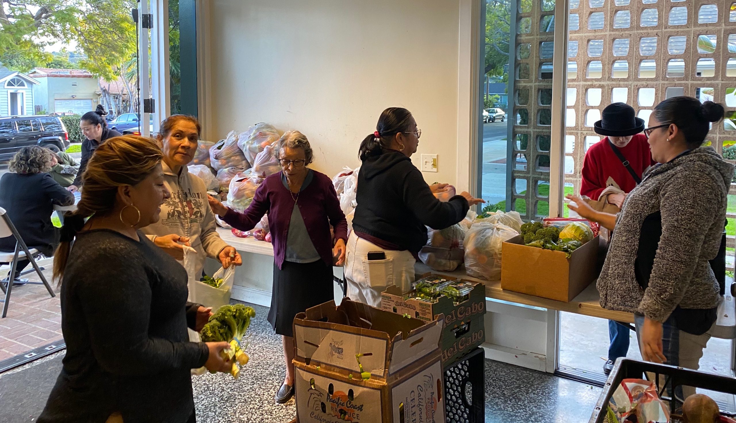 Volunteers at Redeemer Bible Church distributing food to families in need on Santa Barbara&rsquo;s Westside