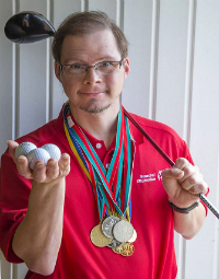 Randy Rogers with Special Olympics medals