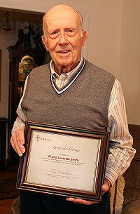 Al Smith with heritage award certificate