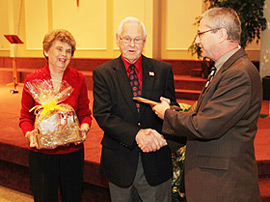 Lead Pastor Rob Decker honors John and Barbara Furrow