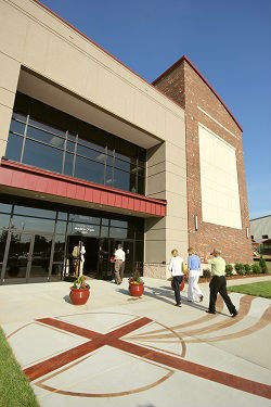 People enter the new Worship Center/Gym on July 6