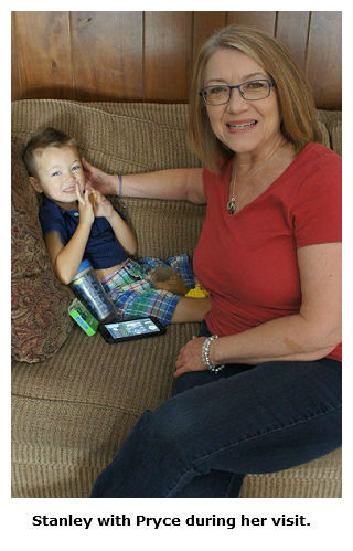 Miriam Stanley enjoys time with her grandson Pryce during her visit