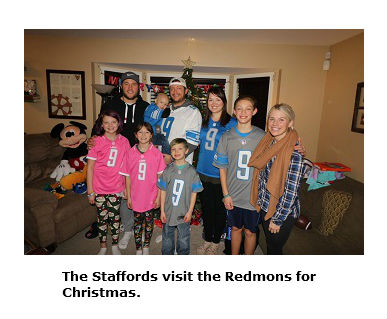 Matthew and Kelly Stafford bring Christmas early to cancer patient Pryce Redmon and his family in December 2018