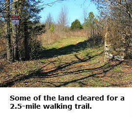 Part of a 2.5-mile walking trail Triad is developing on 92 acres it bought in 2014